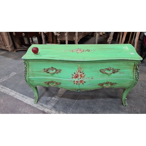 1202 - Star lot : A French chateau Green-painted wooden chest of drawers  with floral motif, featuring two ... 