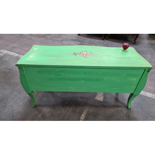 1202 - Star lot : A French chateau Green-painted wooden chest of drawers  with floral motif, featuring two ... 