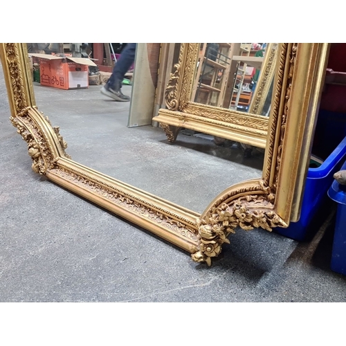 1206 - Super Star lot : A large Gilded Baroque-style mirror with intricate floral and cherub detailing. Fab... 