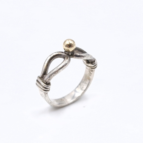 1215 - A lovely unmarked gold and Silver ring. Ring Size: K 
Total Weight: 4.30 grams.