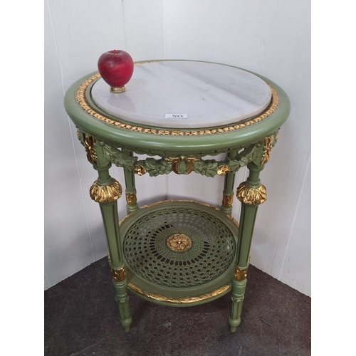 1227 - Star Lot : A very elegant Green and gold marble-topped side table with floral details and woven lowe... 