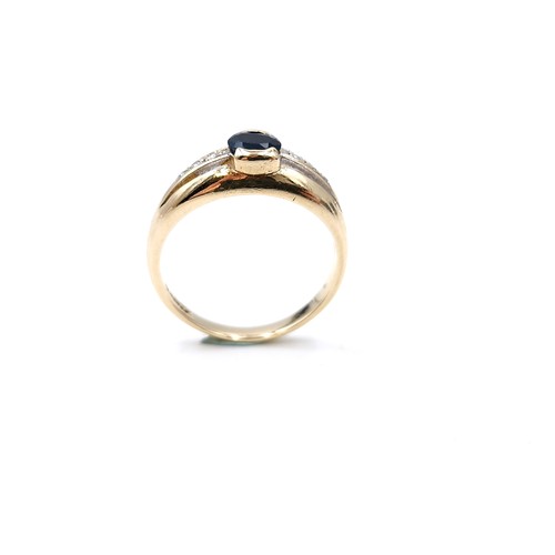 3 - A nine carat gold sapphire stone ring with diamond set shoulders. Size - N. Weight - 2.79 grams.