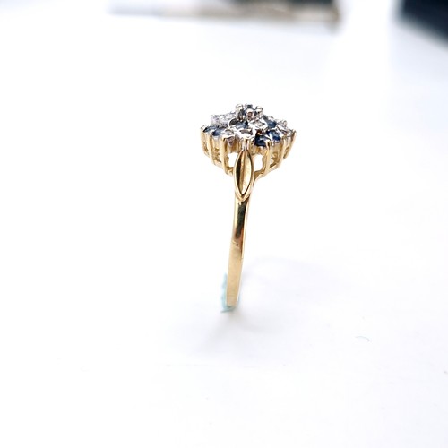 5 - A pretty nine carat gold sapphire and diamond cluster ring. Size - P. Weight - 2.12 grams.