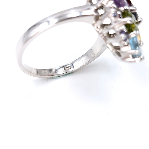 14 - A sterling silver multi stone ring set with garnet, peridot, citrine, amethyst & aquamarine stones. ... 