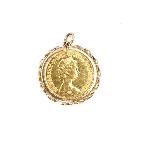 26 - Star Lot : A half Sovereign in a nine carat gold marked 375 coin pendant dated 1982. Total weight - ... 