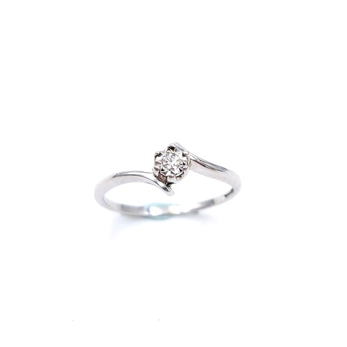 1212 - Star Lot: A 9 carat white gold with a diamond solitaire. Ring Size: K
Total Weight: 1.52 grams