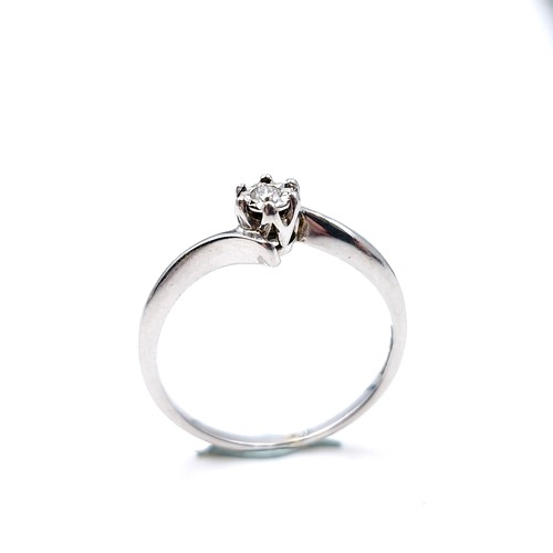 1212 - Star Lot: A 9 carat white gold with a diamond solitaire. Ring Size: K
Total Weight: 1.52 grams