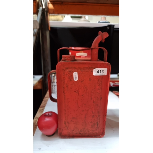 413 - Vintage red metal fuel can with spout and handle, from the mid-20th century. (Santa keeps it on the ... 