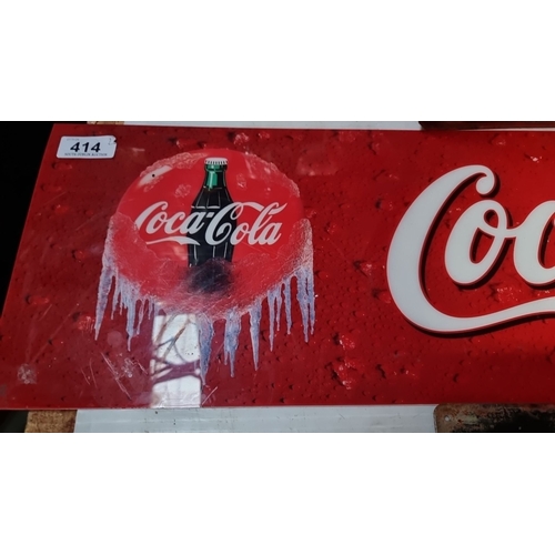 414 - Two Vintage Coca-Cola metal advertisement sign features a classic design, showcasing a woman in a bl... 