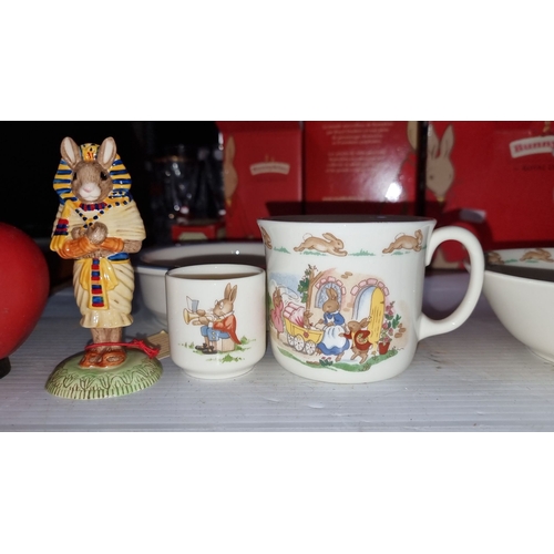 416 - Royal Doulton Bunnykins collection includes a bowl, mug, egg cup, and Pharaoh Mouse figurine with wh... 