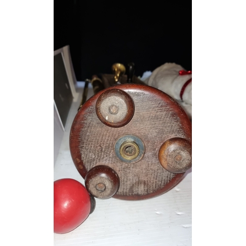 418 - A large and unusual antique Brass and wood desk bell, featuring a sturdy wooden handle and base. Cla... 