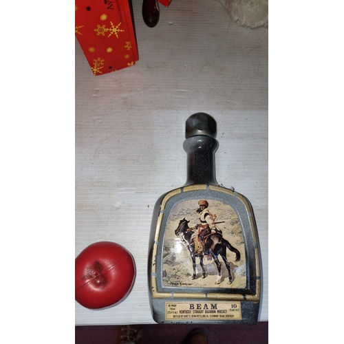 422 - Jim Beam Kentucky Straight Bourbon Whiskey decanter, 10 years old, featuring Frederic Remington artw... 