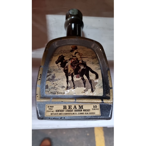 422 - Jim Beam Kentucky Straight Bourbon Whiskey decanter, 10 years old, featuring Frederic Remington artw... 