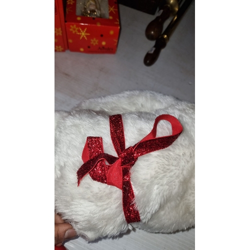 424 - A large Plush Christmas Coca Cola polar bear with a festive red ribbon, accompanied by a red apple a... 