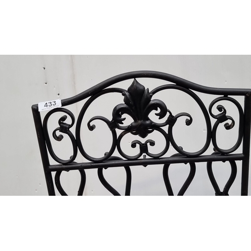 433 - Black wrought iron fireplace tool set featuring scrollwork and fleur-de-lis design. Includes shovel,... 