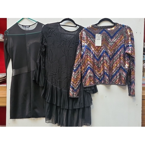 438 - Set of three garments includes a Zara black dress and two tops, one sequined, all size Medium.