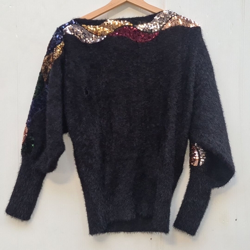 445 - An Azara Paris Black mohair knit sweater featuring multicolor sequin detail. Appox. size M.