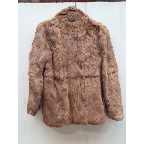 449 - Vintage brown fur coat, mid-length with a classic collar and silky lining. Size XS/S.