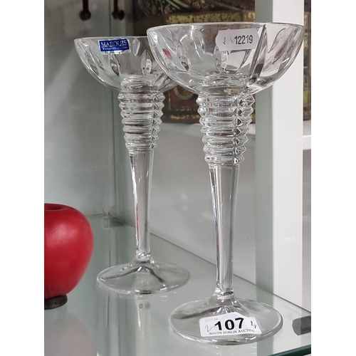 107 - A pair of tall Marquis for Waterford Crystal candle holders. Both in good condition with acid marks ... 