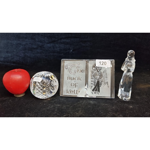 120 - Three Waterford Crystal pieces including a Times Square 2001 spherical paperweight, The Book of Kell... 