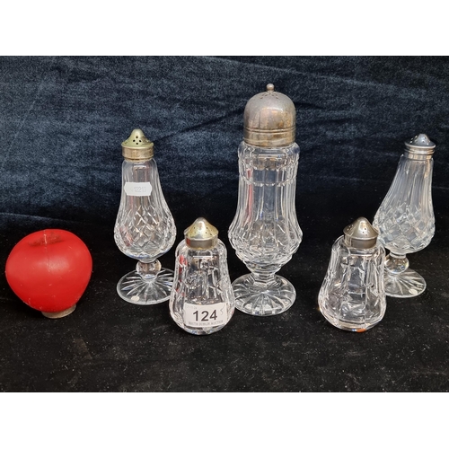 124 - A good selection of Water ford crystal including a sugar shakers and two pairs of salt and peppers. ... 