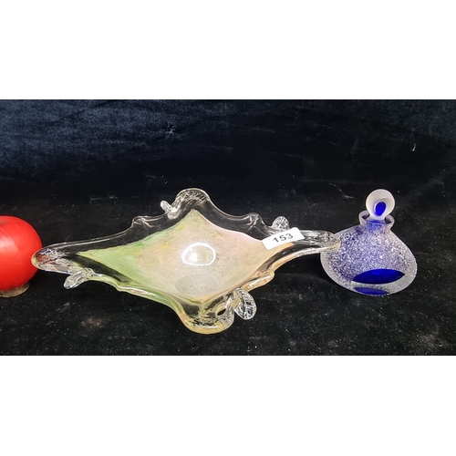 153 - Two striking Vancian glassware items including a hand blown bowl and a textured blue perfume bottle.