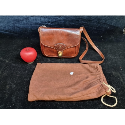 182 - A fabulous quality 'The Bridge' tan leather hand bag with brass hardware. Comes with original dust b... 