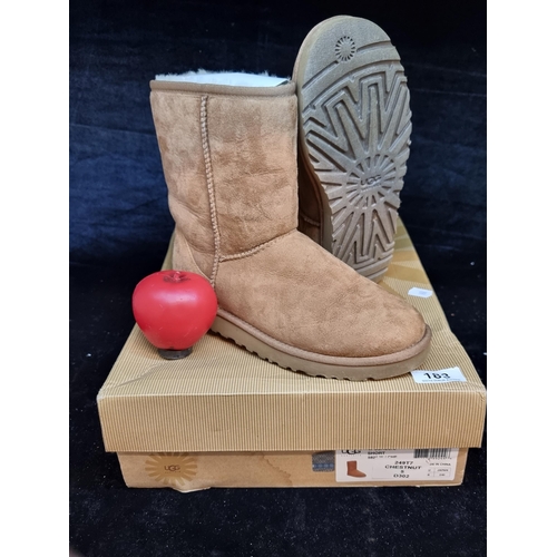 183 - A pair of New Ugg Australia classic short sheep skin boots. Size UK5.5, EU 38. In original box and u... 