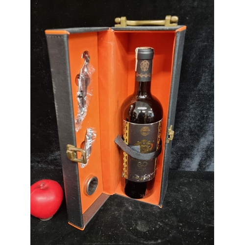 185 - A sealed 750ml bottle of Ruou Vang Wine 2019 complete with original presentation case which include ... 