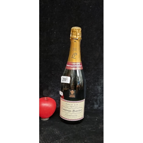 259 - A sealed bottle of Laurent-Perrier Brut L-P Champagne, 750ml 12% vol.One sold at auction in 2018 for... 