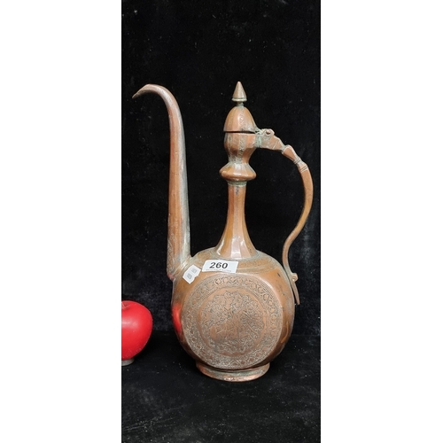 260 - A wonderful 19th century Persian coffee pot in heavy copper. Beautiful elaborate engraved design wit... 