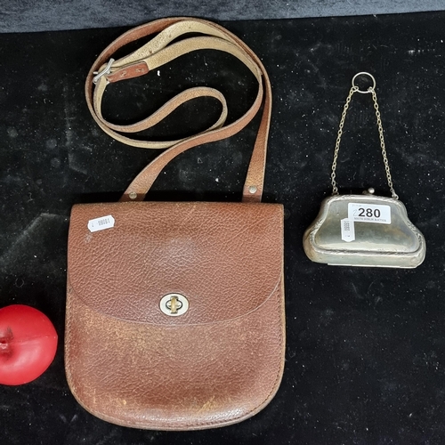 280 - Two antique and vintage accessories including a Victorian EPNS chatelain coin purse with original in... 