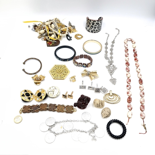 29 - A large collection of vintage costume jewellery. As per photographed. From a French Antique estate s... 