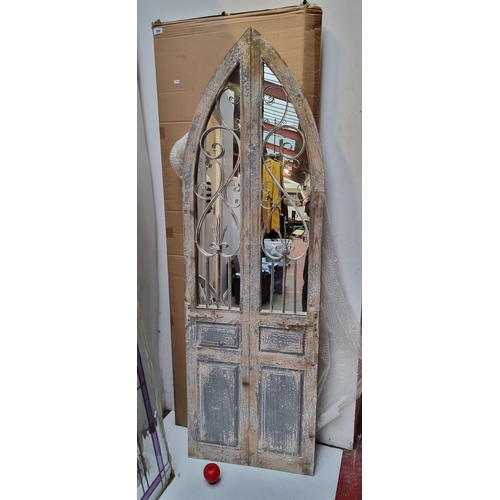 306 - Star lot: An excellent large full size indoor or garden mirror in the form an ecclesiastical gothic ... 