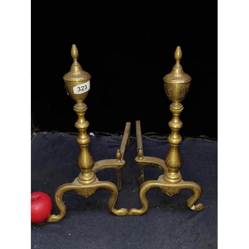 323 - A pair of vintage solid brass country house  fireside dogs.