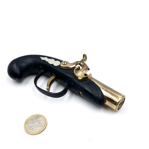 34 - A vintage style pistol lighter. Length - 14 cms. Weight - 258 grams.