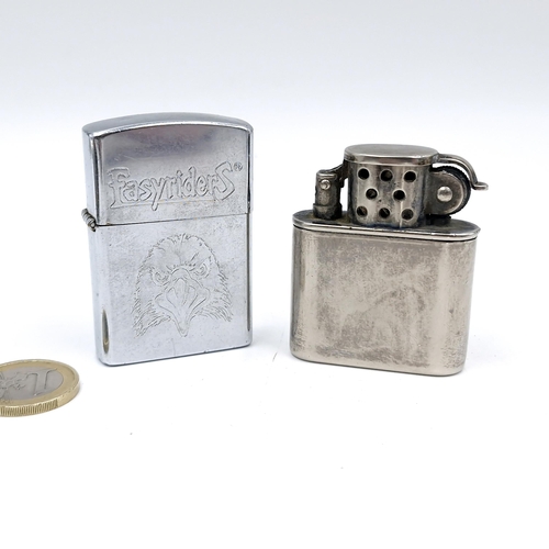 36 - Two metal cased flint lighters, inc an Easy riders zippo example