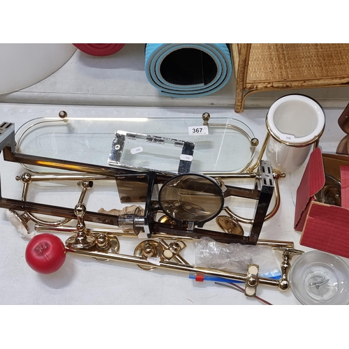 367 - A mixed lot of bathroom items including a glass shelf with brass fittings and a brass towel rack.