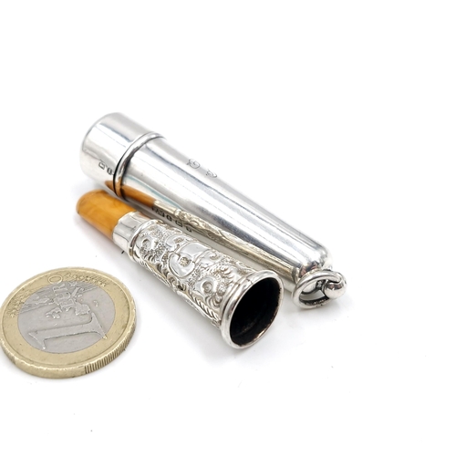 45 - A very pretty sterling silver cheroot holder with amber fitting hallmarked Birmingham.