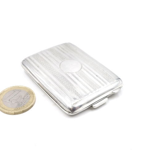 8 - A sterling silver match holder with intricate machine cut detailing and silver gilt interior hallmar... 