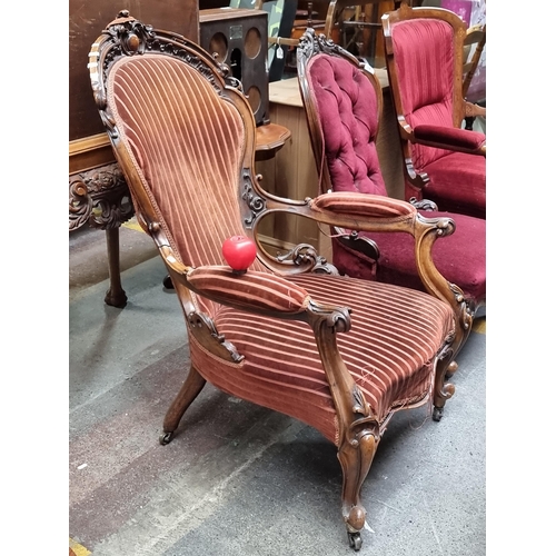 646 - Star lot : A beautiful Victorian carved mahogany armchair. Upholstered in terracotta velvet. Elabora... 