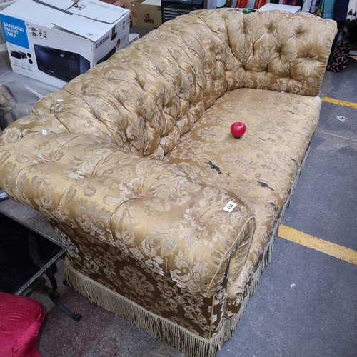 654 - Star Lot : A fabulous roll back Victorian Chesterfield button sofa / couch features luxurious silk d... 