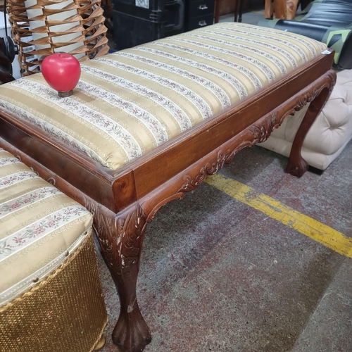 674 - A vintage two person padded hall seat featuring carved cabriole legs.