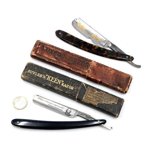 523 - Two open blade (cut throat razors). Both in original boxes, inc an unusual Shakespear example.