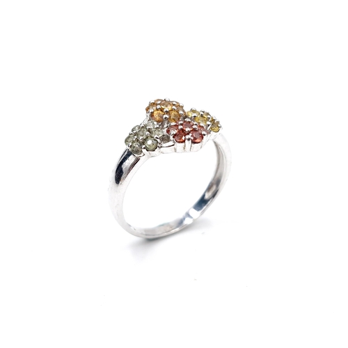 553 - A very pretty multi gem set daisy ring set in sterling silver. Size - U. Weight - 3.64 grams. Boxed.