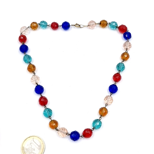 557 - A vintage pretty multi coloured stone necklace. Length - 38 cms.