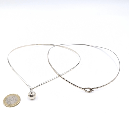 572 - Two sterling silver choker necklaces. Total weight - 15.45 grams.