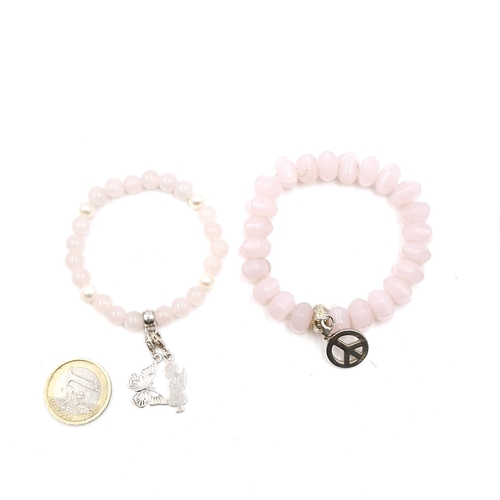 579 - Two pretty Thomas Sabo Rose quartz  bracelets set with sterling silver charms. One with freshwater p... 