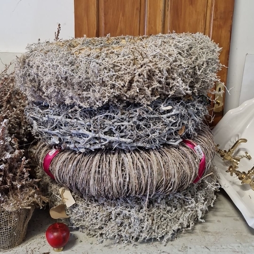 845 - Four Decorative large Christmas wreaths crafted from natural dried materials. Unique textures and ea... 