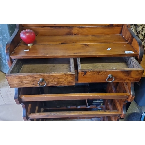 849 - A Handsome wooden wine rack with four bottle shelves and two small drawers, made from stained pine. ... 